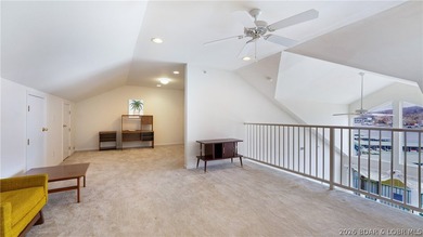 Discover this top-floor 3-bedroom, 3-bathroom condo with a on The Club At Old Kinderhook in Missouri - for sale on GolfHomes.com, golf home, golf lot