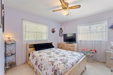 Nestled on a spacious half-acre lot in the desirable Indian Lake on Indian Lake Estates Golf and Country Club in Florida - for sale on GolfHomes.com, golf home, golf lot