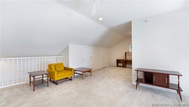 Discover this top-floor 3-bedroom, 3-bathroom condo with a on The Club At Old Kinderhook in Missouri - for sale on GolfHomes.com, golf home, golf lot