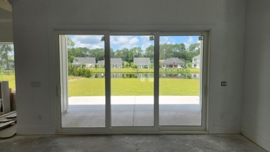 Welcome to this beautifully crafted custom home in the on Wild Wing Plantation in South Carolina - for sale on GolfHomes.com, golf home, golf lot