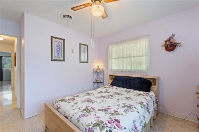 Nestled on a spacious half-acre lot in the desirable Indian Lake on Indian Lake Estates Golf and Country Club in Florida - for sale on GolfHomes.com, golf home, golf lot
