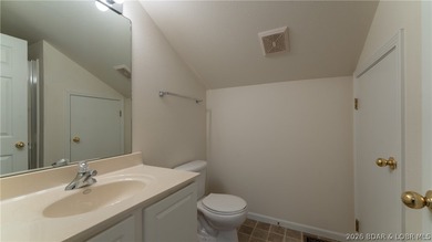 Discover this top-floor 3-bedroom, 3-bathroom condo with a on The Club At Old Kinderhook in Missouri - for sale on GolfHomes.com, golf home, golf lot