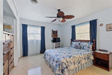Nestled on a spacious half-acre lot in the desirable Indian Lake on Indian Lake Estates Golf and Country Club in Florida - for sale on GolfHomes.com, golf home, golf lot