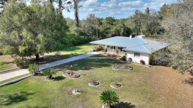Nestled on a spacious half-acre lot in the desirable Indian Lake on Indian Lake Estates Golf and Country Club in Florida - for sale on GolfHomes.com, golf home, golf lot