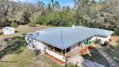 Nestled on a spacious half-acre lot in the desirable Indian Lake on Indian Lake Estates Golf and Country Club in Florida - for sale on GolfHomes.com, golf home, golf lot