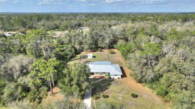 Nestled on a spacious half-acre lot in the desirable Indian Lake on Indian Lake Estates Golf and Country Club in Florida - for sale on GolfHomes.com, golf home, golf lot