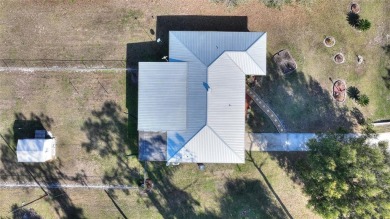 Nestled on a spacious half-acre lot in the desirable Indian Lake on Indian Lake Estates Golf and Country Club in Florida - for sale on GolfHomes.com, golf home, golf lot
