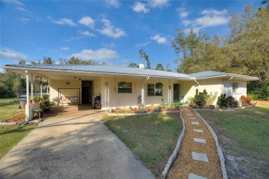 Nestled on a spacious half-acre lot in the desirable Indian Lake on Indian Lake Estates Golf and Country Club in Florida - for sale on GolfHomes.com, golf home, golf lot