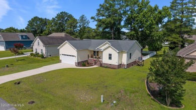 Coming soon! No showings!! Built in the fall of 2022 and nestled on Harbour Point Golf Club in North Carolina - for sale on GolfHomes.com, golf home, golf lot