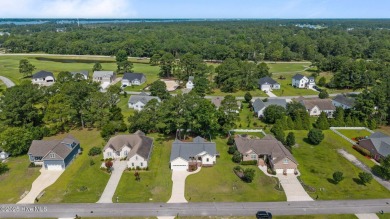 Coming soon! No showings!! Built in the fall of 2022 and nestled on Harbour Point Golf Club in North Carolina - for sale on GolfHomes.com, golf home, golf lot