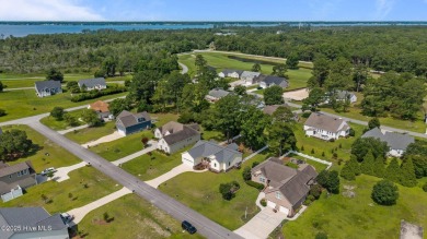 Coming soon! No showings!! Built in the fall of 2022 and nestled on Harbour Point Golf Club in North Carolina - for sale on GolfHomes.com, golf home, golf lot