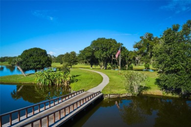 Nestled on a spacious half-acre lot in the desirable Indian Lake on Indian Lake Estates Golf and Country Club in Florida - for sale on GolfHomes.com, golf home, golf lot