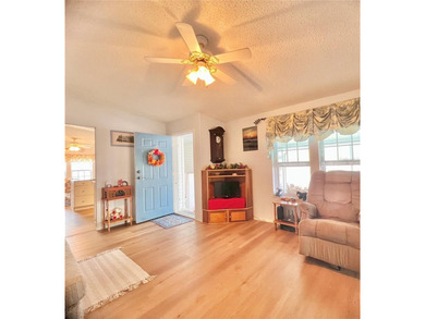 The only 3-Bedroom Home active on the market for sale in Palm on Palm Hill Golf Club in Florida - for sale on GolfHomes.com, golf home, golf lot