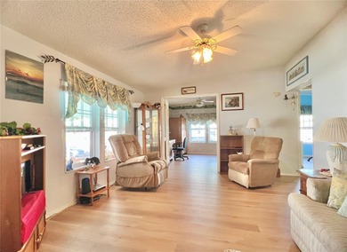 The only 3-Bedroom Home active on the market for sale in Palm on Palm Hill Golf Club in Florida - for sale on GolfHomes.com, golf home, golf lot