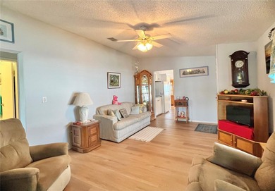 The only 3-Bedroom Home active on the market for sale in Palm on Palm Hill Golf Club in Florida - for sale on GolfHomes.com, golf home, golf lot