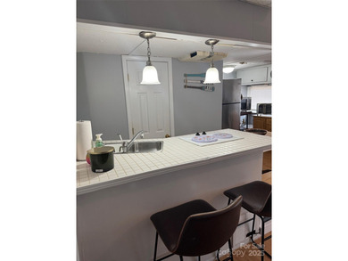 Motivated Sellers! Great Deal with a Lake View and COMES WITH A on The Tillery Tradition Country Club in North Carolina - for sale on GolfHomes.com, golf home, golf lot