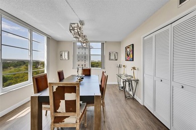 This fully remodeled unit features an open kitchen with white on Palm-Aire Country Club and Resort - Palms in Florida - for sale on GolfHomes.com, golf home, golf lot