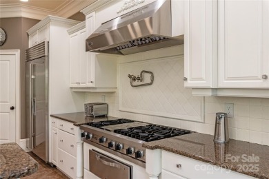 Stunning Private Estate on fairly flat lot overlooking over the on Firethorne Country Club in North Carolina - for sale on GolfHomes.com, golf home, golf lot