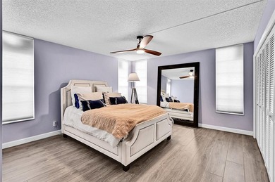 This fully remodeled unit features an open kitchen with white on Palm-Aire Country Club and Resort - Palms in Florida - for sale on GolfHomes.com, golf home, golf lot