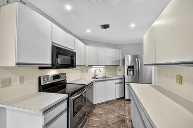 Beautifully maintained 3-bed, 2.5-bath villa with golf course on Fountains Golf and Country Club in Florida - for sale on GolfHomes.com, golf home, golf lot