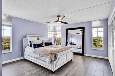 This fully remodeled unit features an open kitchen with white on Palm-Aire Country Club and Resort - Palms in Florida - for sale on GolfHomes.com, golf home, golf lot
