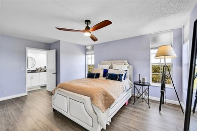 This fully remodeled unit features an open kitchen with white on Palm-Aire Country Club and Resort - Palms in Florida - for sale on GolfHomes.com, golf home, golf lot