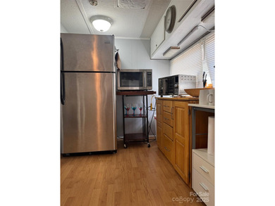 Motivated Sellers! Great Deal with a Lake View and COMES WITH A on The Tillery Tradition Country Club in North Carolina - for sale on GolfHomes.com, golf home, golf lot