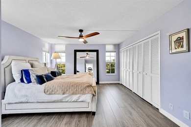 This fully remodeled unit features an open kitchen with white on Palm-Aire Country Club and Resort - Palms in Florida - for sale on GolfHomes.com, golf home, golf lot
