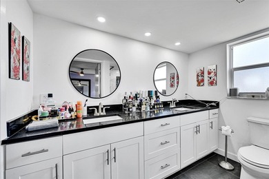 This fully remodeled unit features an open kitchen with white on Palm-Aire Country Club and Resort - Palms in Florida - for sale on GolfHomes.com, golf home, golf lot