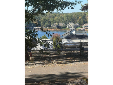 Motivated Sellers! Great Deal with a Lake View and COMES WITH A on The Tillery Tradition Country Club in North Carolina - for sale on GolfHomes.com, golf home, golf lot