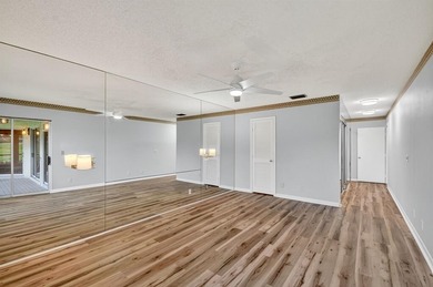 Beautifully maintained 3-bed, 2.5-bath villa with golf course on Fountains Golf and Country Club in Florida - for sale on GolfHomes.com, golf home, golf lot