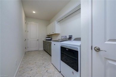 A rare find, a less than 1 year old, popular Egret model on over on Lake Jovita Golf and Country Club in Florida - for sale on GolfHomes.com, golf home, golf lot