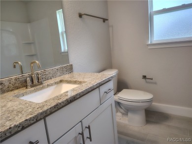 The Oasis House - Located in * The Premier Gated, Lakeside on Inverness Golf and Country Club in Florida - for sale on GolfHomes.com, golf home, golf lot