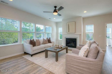 Welcome to this beautifully appointed 4-bedroom, 3-bath home on Carolina National Golf Club in North Carolina - for sale on GolfHomes.com, golf home, golf lot