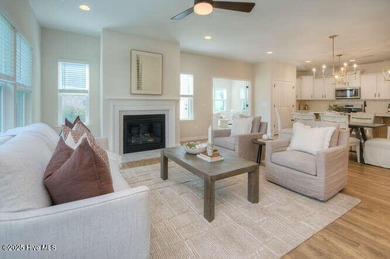 Welcome to this beautifully appointed 4-bedroom, 3-bath home on Carolina National Golf Club in North Carolina - for sale on GolfHomes.com, golf home, golf lot