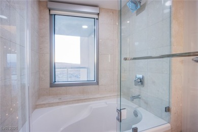 Stunning 2 bed/2 bath condo unit with breathtaking Strip Views on Las Vegas Country Club in Nevada - for sale on GolfHomes.com, golf home, golf lot