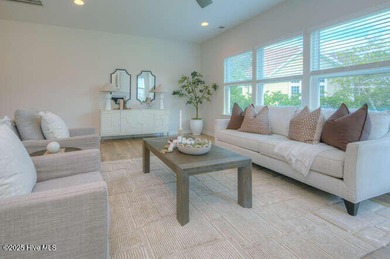 Welcome to this beautifully appointed 4-bedroom, 3-bath home on Carolina National Golf Club in North Carolina - for sale on GolfHomes.com, golf home, golf lot