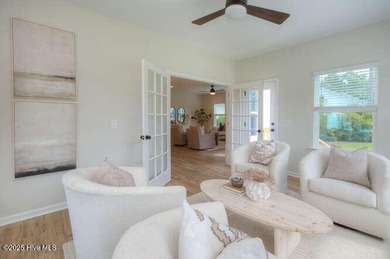 Welcome to this beautifully appointed 4-bedroom, 3-bath home on Carolina National Golf Club in North Carolina - for sale on GolfHomes.com, golf home, golf lot