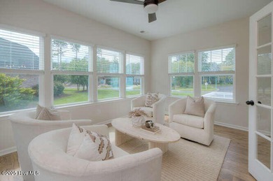 Welcome to this beautifully appointed 4-bedroom, 3-bath home on Carolina National Golf Club in North Carolina - for sale on GolfHomes.com, golf home, golf lot