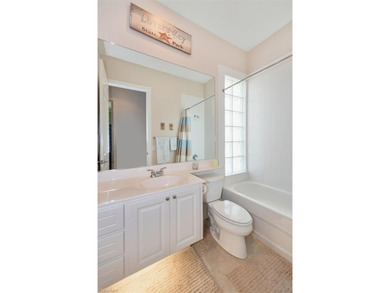 Stunning Lakefront Oakmont Home in Guard-Gated VillageWalk of on Palmira Golf and Country Club in Florida - for sale on GolfHomes.com, golf home, golf lot