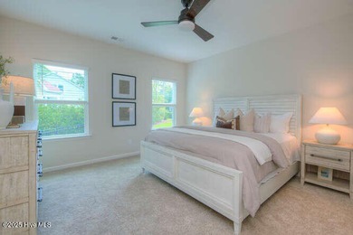 Welcome to this beautifully appointed 4-bedroom, 3-bath home on Carolina National Golf Club in North Carolina - for sale on GolfHomes.com, golf home, golf lot