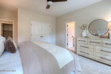 Welcome to this beautifully appointed 4-bedroom, 3-bath home on Carolina National Golf Club in North Carolina - for sale on GolfHomes.com, golf home, golf lot