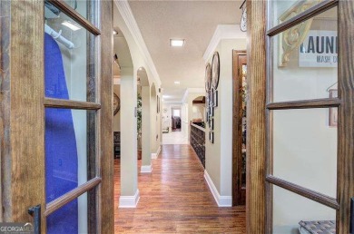 **Luxury Awaits in Waleska's Elite Gated Community in Lake on The Highlands Course at Lake Arrowhead in Georgia - for sale on GolfHomes.com, golf home, golf lot