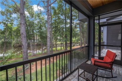Enjoying views across a lake toward Moss Creek South's 8 th Hole on Moss Creek Golf Club in South Carolina - for sale on GolfHomes.com, golf home, golf lot