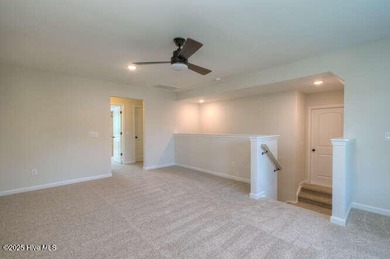 Welcome to this beautifully appointed 4-bedroom, 3-bath home on Carolina National Golf Club in North Carolina - for sale on GolfHomes.com, golf home, golf lot