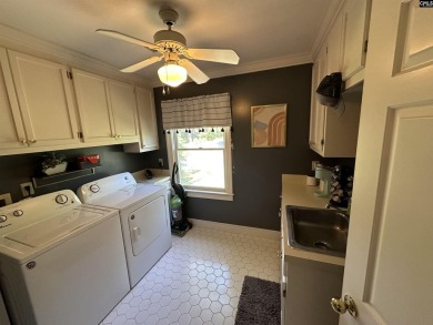 Spaciously and thoughtfully designed, this all-brick 5 bedroom on The Wildewood Country Club in South Carolina - for sale on GolfHomes.com, golf home, golf lot
