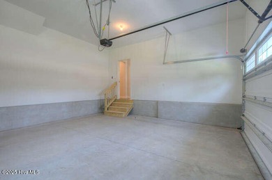 Welcome to this beautifully appointed 4-bedroom, 3-bath home on Carolina National Golf Club in North Carolina - for sale on GolfHomes.com, golf home, golf lot