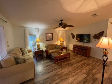 Beautifully Maintained Home in the Gated Community of Pine on Pine Lakes Country Club in Florida - for sale on GolfHomes.com, golf home, golf lot