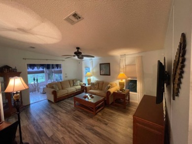 Beautifully Maintained Home in the Gated Community of Pine on Pine Lakes Country Club in Florida - for sale on GolfHomes.com, golf home, golf lot