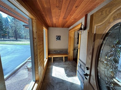 Beautiful open concept single level custom home overlooking the on Double Arrow Lodge in Montana - for sale on GolfHomes.com, golf home, golf lot